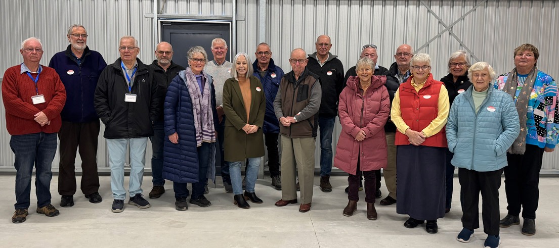 The trust and its volunteers at the garage opening